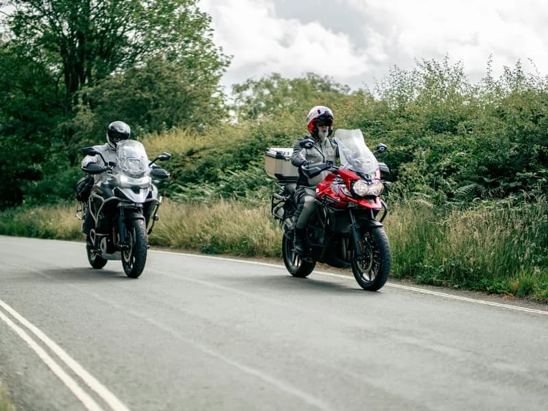 Motorcycle riding along a scenic twisty road